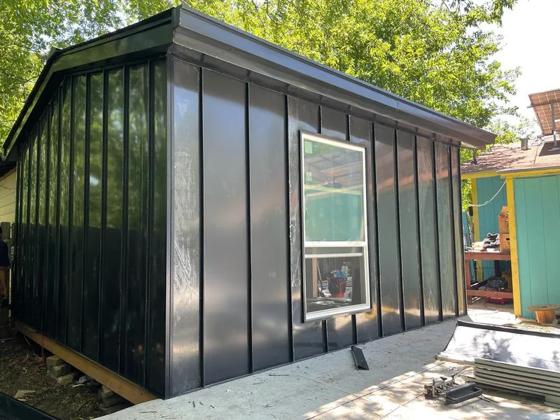 Black standing seam metal wall panels for Roof Inspection in Wichita Falls