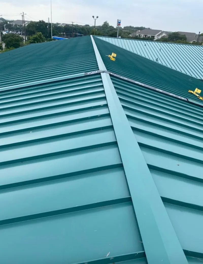 Green commercial metal roof ridge and valley for Metal Roof Repair in Wichita Falls