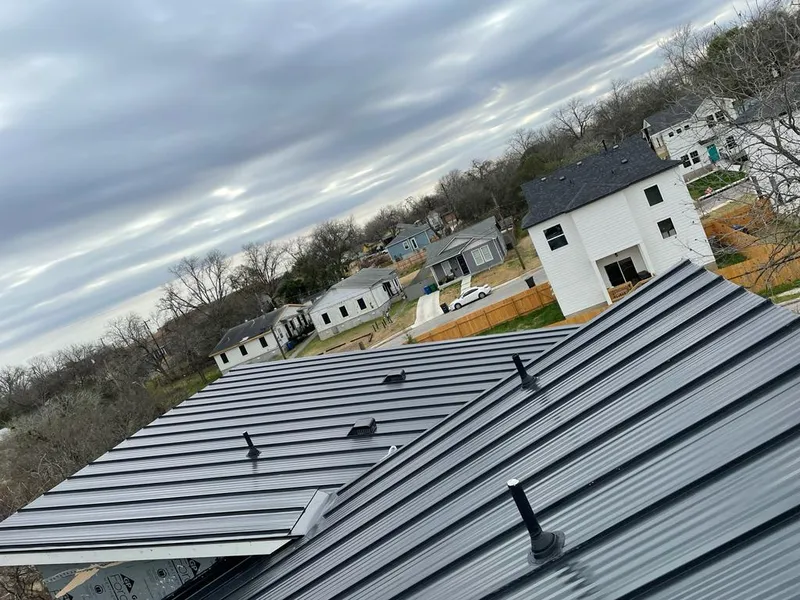 Standing seam metal roof panels with vents for Skylight Repair in Wichita Falls